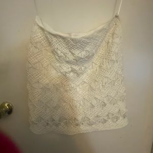 white skirt is made hand knit